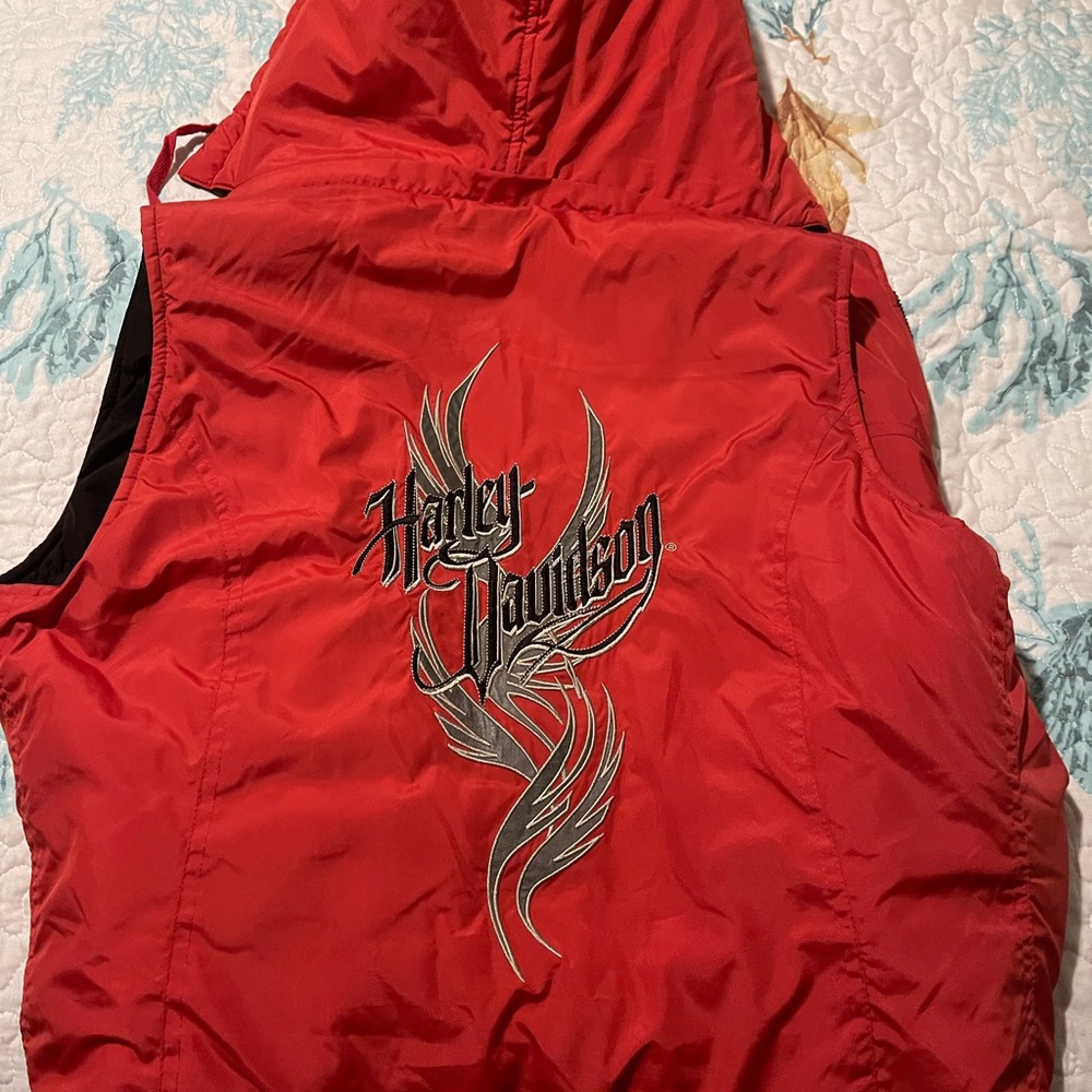 HD reversible HD vest and has removable hoodie.